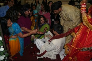 The groom trying to get his shoes back. Photo by Fred Hsu.
