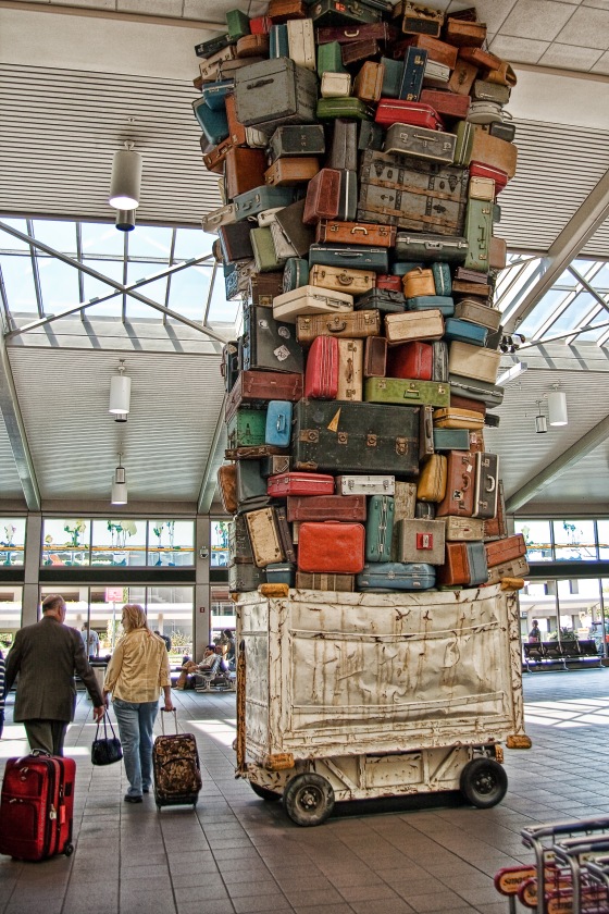 If your suitcase is in this pile, it better be a sturdy one. Photo by Laura Gilmore.